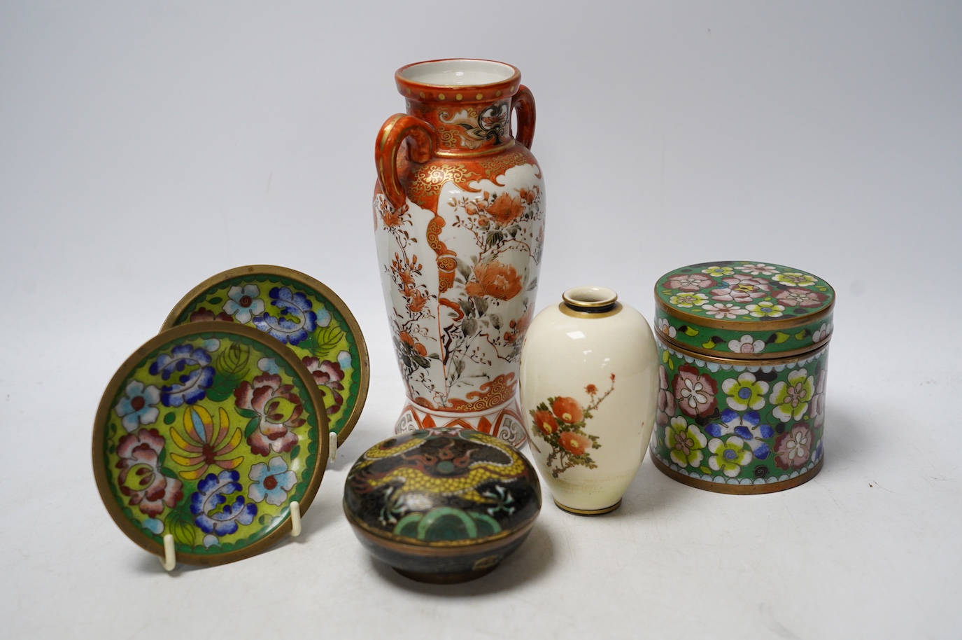 Japanese items comprising miniature Satsuma vase, four pieces of cloisonné and a Kutani vase, largest 17.5cm high. Condition - mostly fair to good